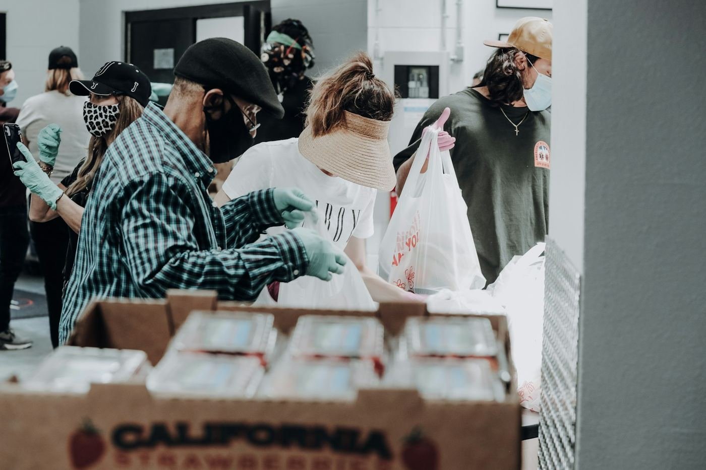 Volunteers sorting donated food