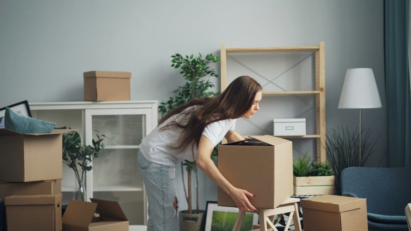 A woman setting up a new home