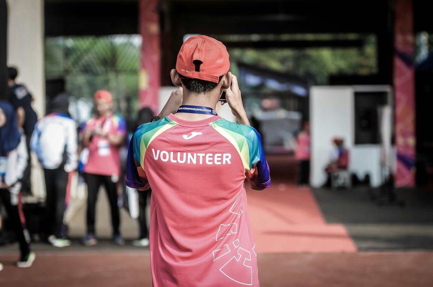 A volunteer helping at a community event